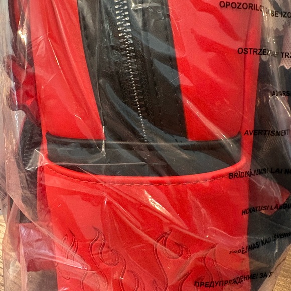 Loungefly Red Hot Stuff Backpack - Picture 2 of 5